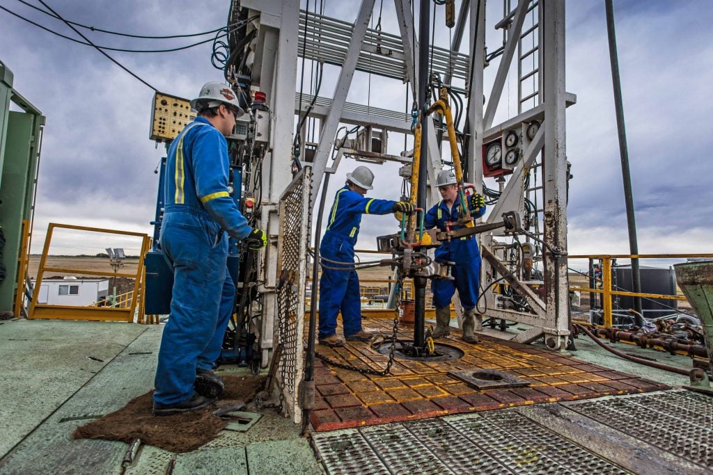 Workers on a drilling rig